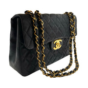 Chanel - CC Classic Jumbo Maxi Single Flap Black Quilted Lambskin