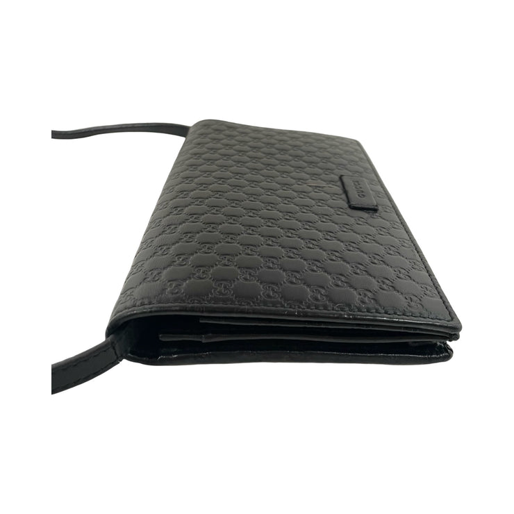 Gucci - Black Micro Guccissima Wallet on Leather Strap