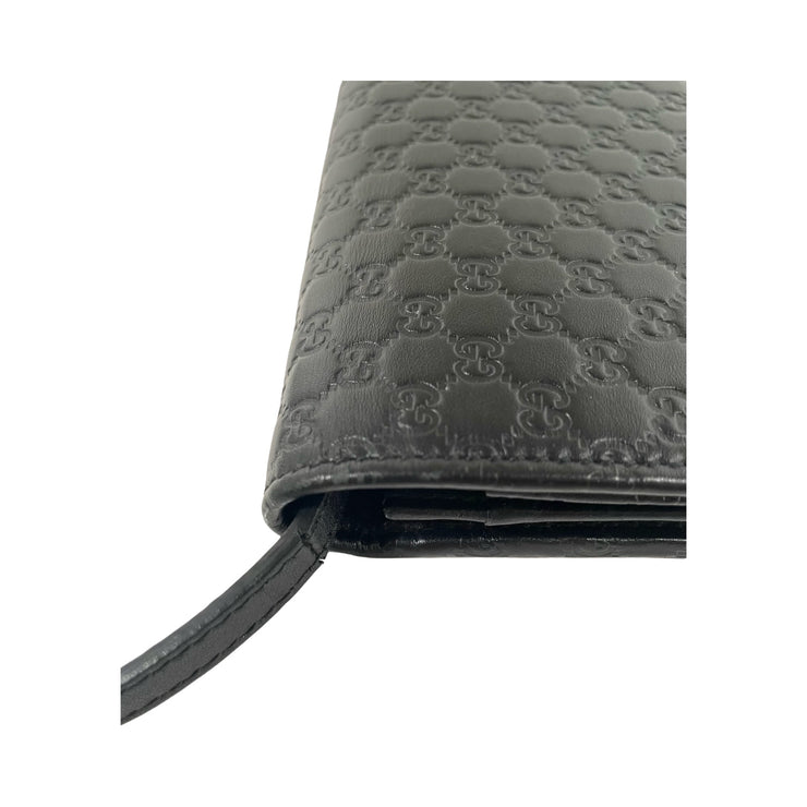 Gucci - Black Micro Guccissima Wallet on Leather Strap